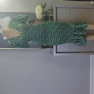 Gently use size  medium green dress with white flowers